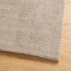 HUARTE homokszínű rövid szálú puha és mosható szőnyeg 80x200 cm